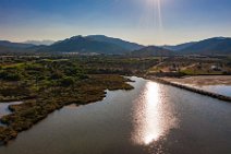 AERIAL ART - pond and mountains behind Porto Taverna beach before sunset - Sardinia - Italy AERIAL ART - pond and mountains behind Porto Taverna beach before sunset - Sardinia - Italy .jpg