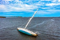 AERIAL ART - stranded sailboat near Picnic Island - Florida - USA 2 AERIAL ART - stranded sailboat near Picnic Island - Florida - USA 2.jpg