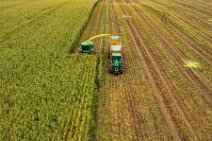 AERIAL ART - CORN HARVEST with corn chopper and tractor and trailer 17 AERIAL ART - CORN HARVEST with corn chopper and tractor and trailer 17.jpg
