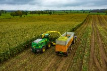 AERIAL ART - CORN HARVEST with corn chopper and tractor and trailer 28 AERIAL ART - CORN HARVEST with corn chopper and tractor and trailer 28.jpg