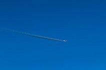 LUFTHANSA Airbus A330-300 with vapor trail in blue sky LUFTHANSA Airbus A330-300 with vapor trail in blue sky