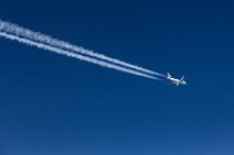 Aegean Airlines Airbus A320 in Flight through blue skies Aegean Airlines Airbus A320 in Flight through blue skies