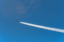 Ryanair Boeing B737 with vapor trail in flight Ryanair Boeing B737 with vapor trail in flight