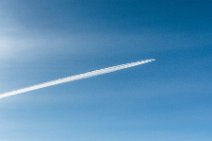 Qatar Airways Boeing B747 in flight with vapor trail Qatar Airways Boeing B747 in flight with vapor trail