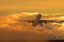 AIR CANADA AIRBUS A330 TAKING OFF ON WET RUNWAY DURING SUNSET 02
