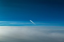 Aircraft with vaportrail - above cloouds Aircraft with vaportrail - above cloouds.jpg