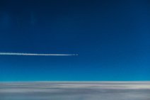 Airliner with vapor trail in blue skies 1 Airliner with vapor trail in blue skies 1.JPG