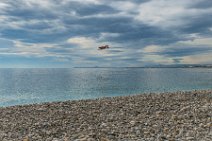 Airplane passing the beach - Nice - France 01 Airplane passing the beach - Nice - France 01