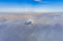 Shadow of an Airbus A320 in the clouds Shadow of an Airbus A320 in the clouds.jpg