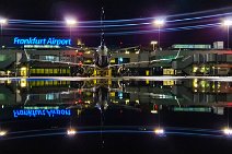 Lufthansa A320 NEO and terminal mirroring in a rain puddle - Frankfurt Airport - Germany Lufthansa A320 NEO and terminal mirroring in a rain puddle - Frankfurt Airport - Germany.jpg