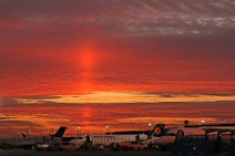 LUFTHANSA REGIONAL CANADAIR JET UNDER BURNING SKIES