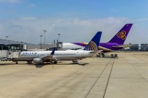 Thai Airways Airbus A380 and United Boeing B737 - Kansai Airport Osaka - RJBB - Japan Thai Airways Airbus A380 and United Boeing B737 - Kansai Airport Osaka - RJBB - Japan