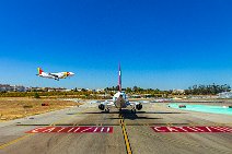 Two Aircraft - holding short RWY 03 and short final RWY 03 - LPPT 01 Two Aircraft - holding short RWY 03 and short final RWY 03 - LPPT 01