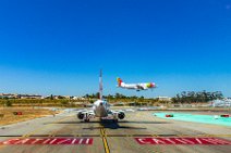 Two Aircraft - holding short RWY 03 and short final RWY 03 - LPPT 02 Two Aircraft - holding short RWY 03 and short final RWY 03 - LPPT 02
