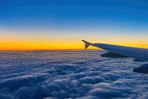 A320 wing tip over the clouds during sunrise A320 wing tip over the clouds during sunrise.jpg