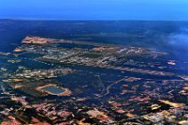 20140719_091853_aerial_KUALA_LUMPUR_INTERNATIONAL_AIRPORT_WMKK_Malaysia aerial: KUALA LUMPUR INTERNATIONAL AIRPORT (WMKK), Malaysia; in the front: SEPANG INTERNATIONAL CIRCUIT (F1 racetrack)