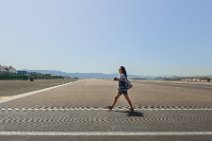 Lady crossing the runway of Gibraltar airport Lady crossing the runway of Gibraltar airport