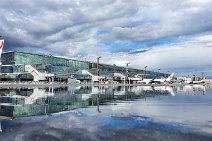 Frankfurt Airport Terminal 2 mirroring in a rain pouddle - Germany 2 Frankfurt Airport Terminal 2 mirroring in a rain pouddle - Germany 2.jpg