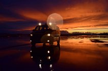 FOLLOW ME CAR ON WET APRON DURING SUNSET - EDDF 01