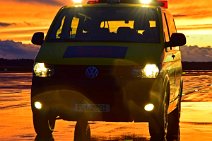 FOLLOW ME CAR ON WET APRON DURING SUNSET - EDDF 02