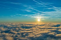 Vapor trails and sunset above a cloud layer 01 Vapor trails and sunset above a cloud layer 01.jpg
