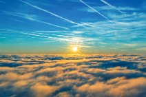 Vapor trails and sunset above a cloud layer 03 Vapor trails and sunset above a cloud layer 03.jpg