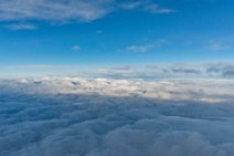 Blue sky over a cloud layer Blue sky over a cloud layer.jpg