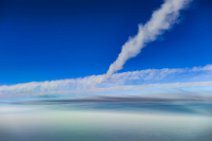 Vapor trails crossing in blue skies Vapor trails crossing in blue skies.JPG