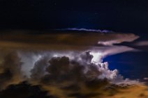Illuminated thunderclouds seen from the air 02 Illuminated thunderclouds seen from the air 02.jpg