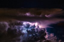 Illuminated thunderclouds seen from the air 04 Illuminated thunderclouds seen from the air 04.jpg