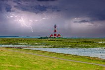 Lightning strikes around lighthouse Westerhever Sand - Germany Lightning strikes around lighthouse Westerhever Sand - Germany.jpg
