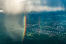 Rainshower with rainbow - seen from the air - near Frankfurt - Germany 02 Rainshower with rainbow - seen from the air - near Frankfurt - Germany 02.jpg