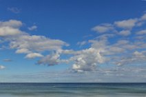 Baltic sea with blue sky and white clouds Baltic sea with blue sky and white clouds