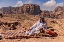 Man resting in Petra - Jordan Man resting in Petra - Jordan