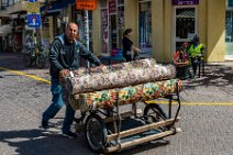 Man transporting carpets - Tel Aviv - Israel Man transporting carpets - Tel Aviv - Israel