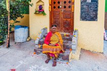 Lady in front of a shrine in a Dhobi Ghat - Bangalore - India 02 Lady in front of a shrine in a Dhobi Ghat - Bangalore - India 02.jpg