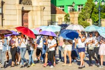 Chinese toursists with umbrellas - Qingdao - China Chinese toursists with umbrellas - Qingdao - China.JPG