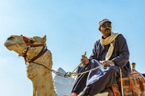 HDR - Camel guide at the Giza Pyramids - Cairo - Egypt HDR - Camel guide at the Giza Pyramids - Cairo - Egypt