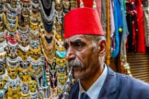 Man with red fez and water pipe - Chan El Chalili bazaar - Cairo - Egypt 01 Man with red fez and water pipe - Chan El Chalili bazaar - Cairo - Egypt 01