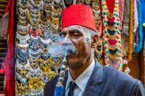 Man with red fez and water pipe - Chan El Chalili bazaar - Cairo - Egypt 06 Man with red fez and water pipe - Chan El Chalili bazaar - Cairo - Egypt 06