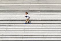 Little boy on the stairs of La Grande Arche - La Defense - Paris - France Little boy on the stairs of La Grande Arche - La Defense - Paris - France.jpg