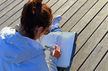 STUDENT SKETCHING THE RAMBLA DE MAR - BARCELONA - SPAIN STUDENT SKETCHING THE RAMBLA DE MAR - BARCELONA - SPAIN