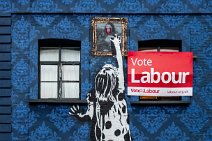 Graffiti girl on a blue facade - Portobello Road Market - Notting Hill - London - United Kingdom Graffiti girl on a blue facade - Portobello Road Market - Notting Hill - London - United Kingdom