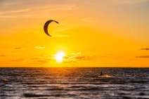 Kite surfer during sunset - western beach in Grossenbrode - Germany 02 Kite surfer during sunset - western beach in Grossenbrode - Germany