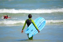 SURFER AT SURFERS CORNER - MUIZENBERG - SOUTH AFRICA 01 SURFER AT SURFERS CORNER - MUIZENBERG - SOUTH AFRICA 01