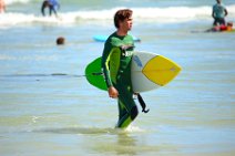 SURFER WITH BOARD - MUIZENBERG - SOUTH AFRICA 01 SURFER WITH BOARD - MUIZENBERG - SOUTH AFRICA 01