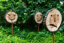 Faces on slices of a tree - Germany Faces on slices of a tree - Germany