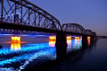 20141103_110529_colorful_illuminated_YALU_river_bridge_DANDONG_China CHINA-NORTH KOREAN friendhip bridge across YALU river, DANDONG, China