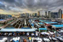 HDR - SUNRISE AT TSUKIJI FISHMARKET WITH TOKYO SKYLINE - JAPAN 1