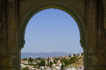 View through an Alhambra window to Albaicin - Granada - Spain View through an Alhambra window to Albaicin - Granada - Spain